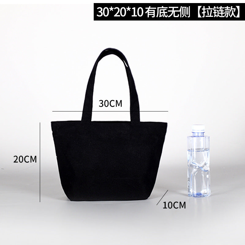 Thick black and white canvas bag with multiple sizes and shapes