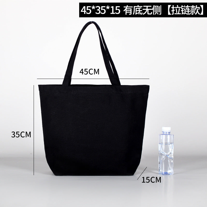 Thick black and white canvas bag with multiple sizes and shapes