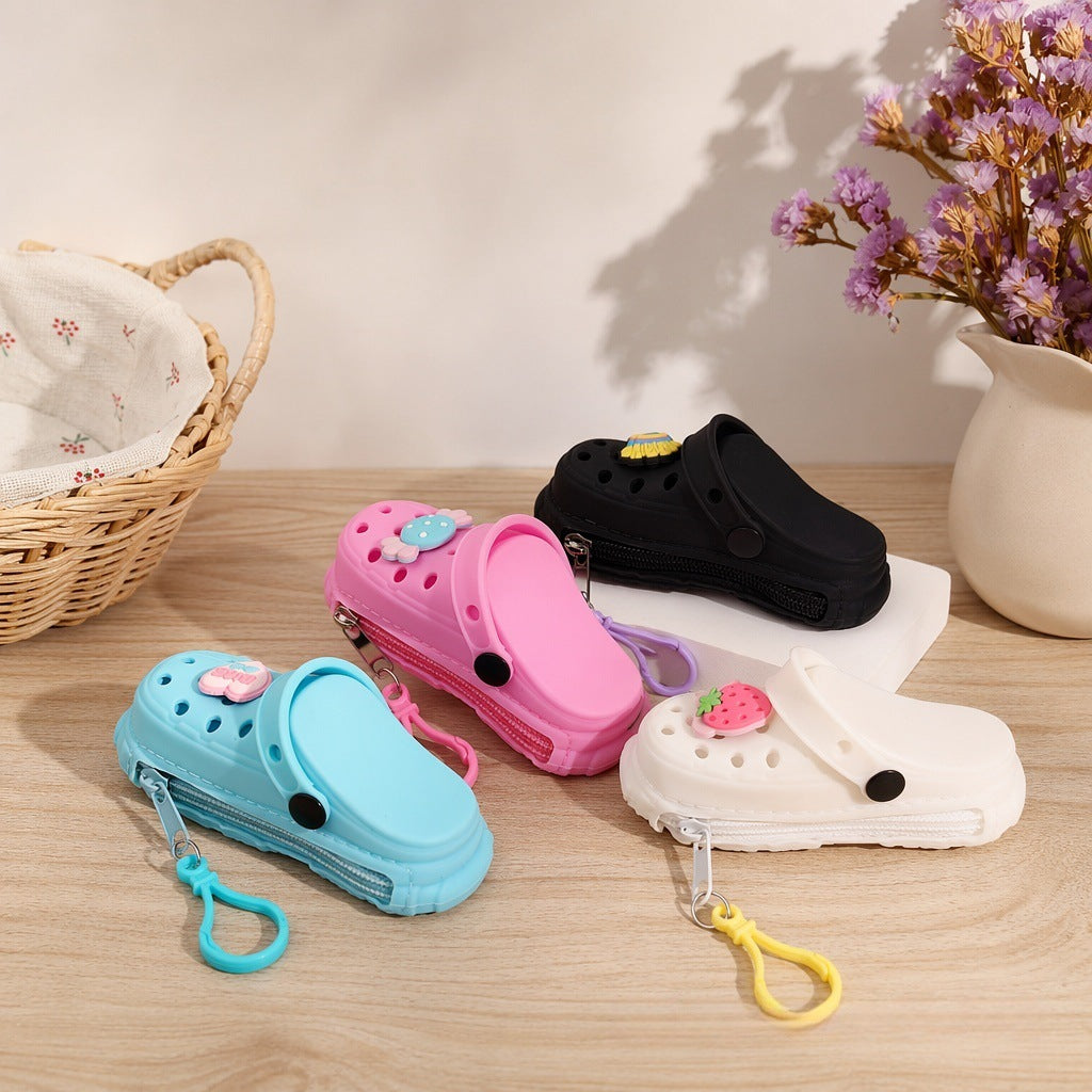 New hole cute little slippers silicone keychain children's change bag student schoolbag pendant storage bag